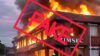 Fact Check: No, this image of the ZIMSEC building up in flames is fabricated